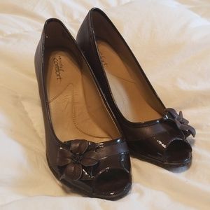 Brown peep toe heels with flower